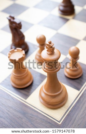 A checkmate pattern on the corner of the chessboard
