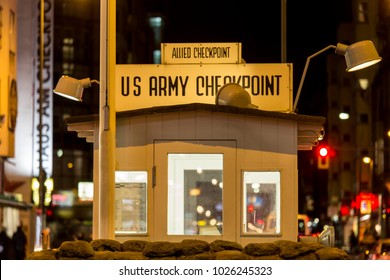 checkpoint charlie berlin germany at night