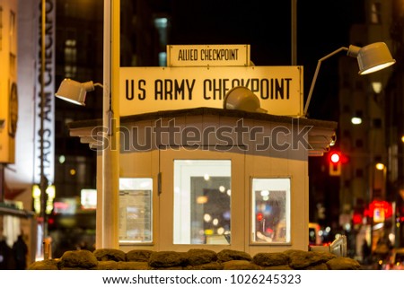 checkpoint charlie berlin germany at night