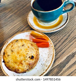 Cheddar Biscuit Breakfast Muffin With Coffee On Wood Table At Cafe Overhead Top View