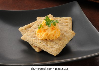 Cheddar Cheese Spread On Whole Wheat Crackers