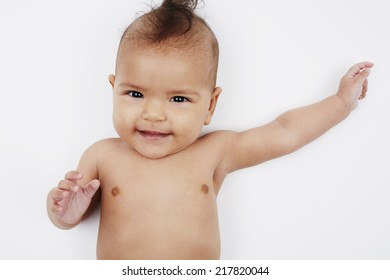 Cheeky Six Month Old Baby Girl With Mohican Hairstyle 