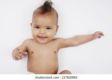 Cheeky Six Month Old Baby Girl With Mohican Hairstyle 