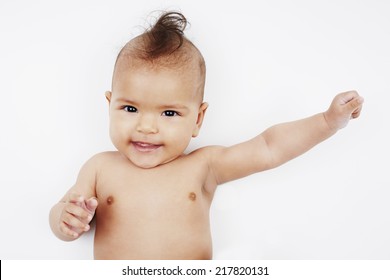 Cheeky Six Month Old Baby Girl With Mohican Hairstyle 