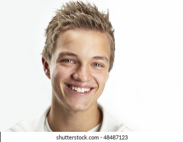 A Cheerful 16 Year Old Boy On A White Background