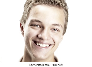 A Cheerful 16 Year Old Boy On A White Background