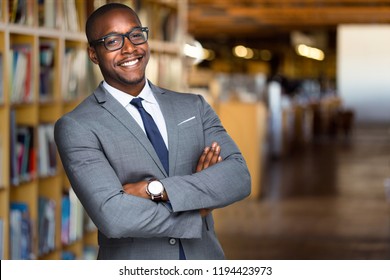 Cheerful African American Educator University Professor, Founder, Administrator, In Library