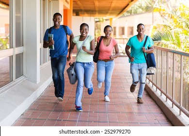 Cheerful African College Students Running To Lecture Hall