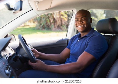 Cheerful African Man Inside His New Car