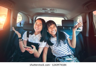 Cheerful Asian Teenager Happiness Emotion Sitting In Passenger Car