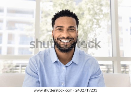 Image, Stock Photo Portrait of Black young woman laughing with genuine emotion while enjoying party with friends at home