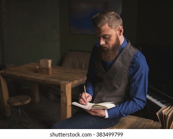 Cheerful Bearded Author Is Writing A Poem