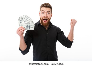 Cheerful Bearded Business Man In Shirt Holding Money And Looking At The Camera Over White Background