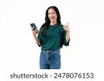 Cheerful beautiful Asian woman holding smartphone with shows like sign on white background.