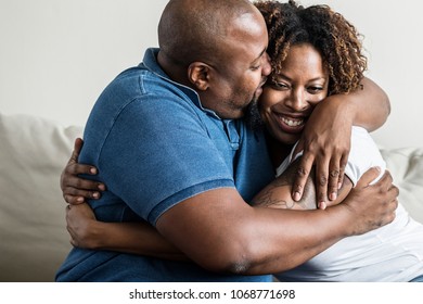 A cheerful black couple - Shutterstock ID 1068771698