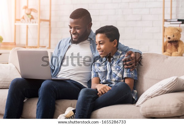 Cheerful Black Father Son Watching Comedy Stock Photo 1655286733 