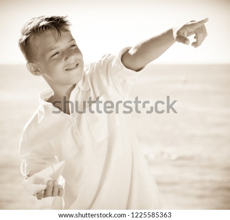 Similar – Foto Bild Kind spielt mit Sand auf den Dünen