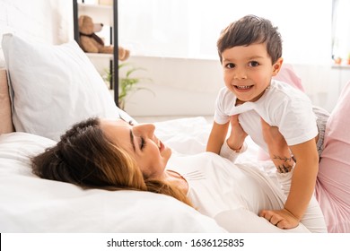 cheerful boy looking at