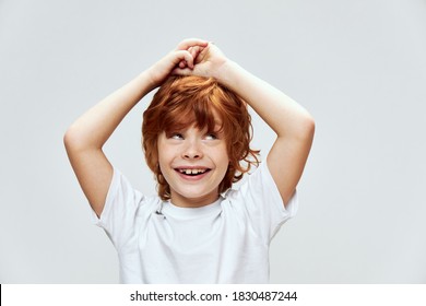 Cheerful Boy Smile Look Up Hands On Head White T-shirt 