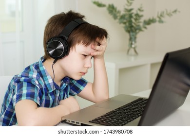 Cheerful boy studying computer in beautiful style. Online training. - Shutterstock ID 1743980708