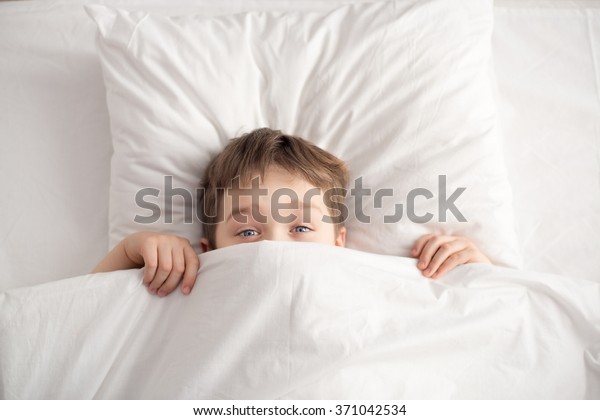 white bed for boy