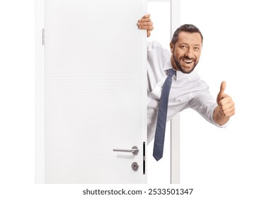 Cheerful businessman opening a door and gesturing thumbs up - Powered by Shutterstock