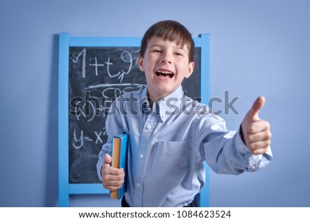 Similar – Image, Stock Photo Happy kig laughing and showing liquid in flask