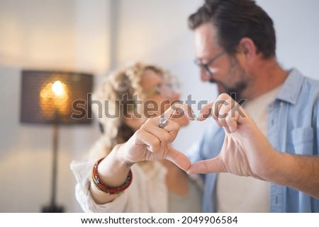 Similar – Image, Stock Photo Woman making eyeglasses shape with bangles in studio
