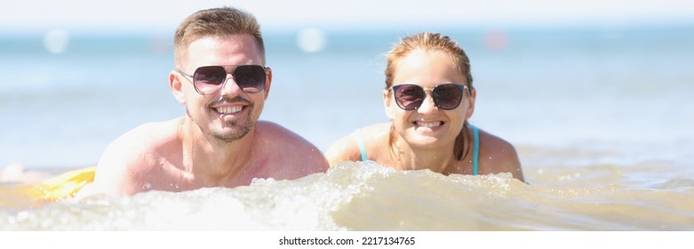 Cheerful Couple Posing For Picture Together In Sea Or Ocean Water