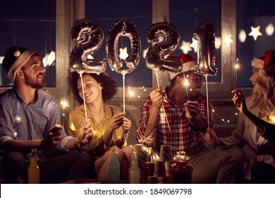 Cheerful Couples Having Good Time Together At New Year Eve Home Party In Festive Atmosphere. New Year, Home Party, Friends Time Together