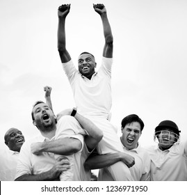 Cheerful cricketers celebrating their victory - Powered by Shutterstock