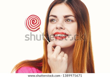 cheerful cute woman with a round candy red lips model light background