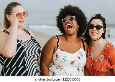 Cheerful diverse plus size women at the beach - Shutterstock ID 1225035505