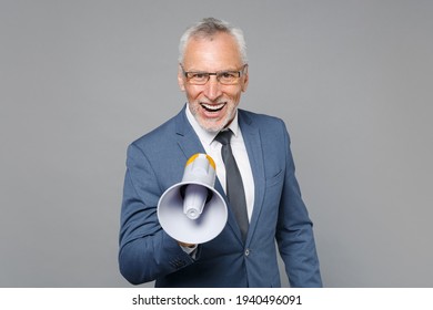 Cheerful Elderly Gray-haired Mustache Bearded Business Man In Classic Blue Suit Shirt Tie Isolated On Grey Background Studio Portrait. Achievement Career Wealth Business Concept. Scream In Megaphone