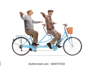 Cheerful Elderly Men Riding A Tandem Bicycle And Spreading Arms Isolated On White Background