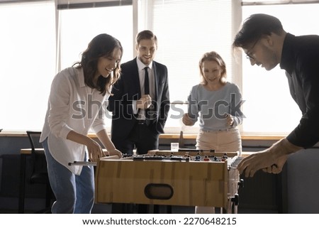 Similar – Image, Stock Photo Young woman engages in paper crafting at home