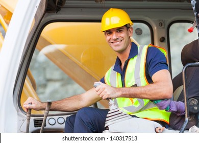 Cheerful Excavator Operator On Construction Site