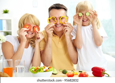 Cheerful Family Playing With Vegetables In Kitchen, Healthy Food