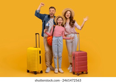 A cheerful family of three, featuring a man, woman, and child, are excited about their upcoming trip. The parents stand with their arms raised in jubilation while the child clings to the woman hand - Powered by Shutterstock