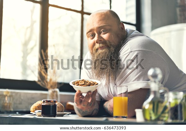 Cheerful Fat Man Eating Cornflakes Kitchen Stock Photo Edit Now 636473393