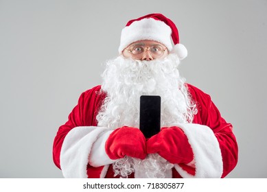 Cheerful Father Frost Presenting Mobile Phone