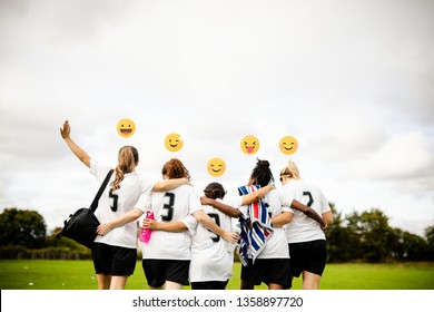 Cheerful female football players huddling - Powered by Shutterstock