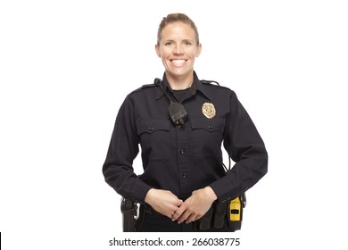 Cheerful Female Police Officer Standing Against White Background