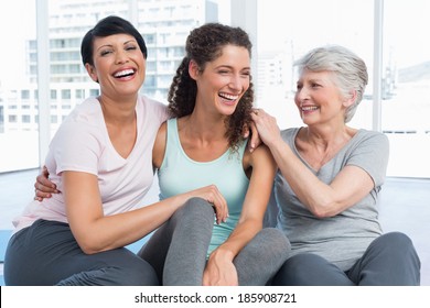 Cheerful Fit Women Sitting In The Yoga Class