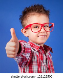 Cheerful Five Years Old Boy With Thumb Up