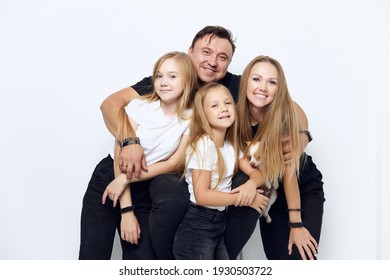 Cheerful Friendly Family Hug Studio Isolated Background