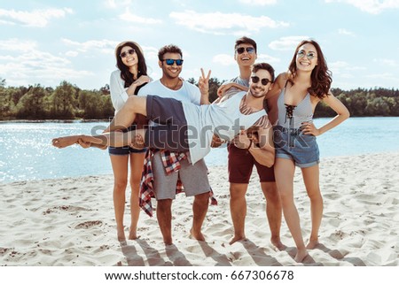 Similar – Image, Stock Photo Young people having fun in summer party outdoors