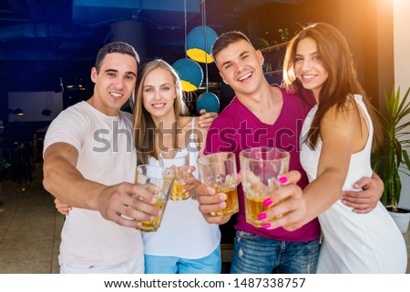 Similar – Group of young people having fun in summer party