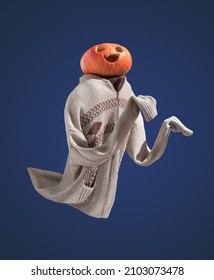 Cheerful Ghost With Pumpkin Shaped Head, Dressed In Warm Stylish Jacket. Idea Prank On Halloween Night.