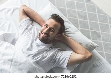 Cheerful Guy Waking Up In The Morning